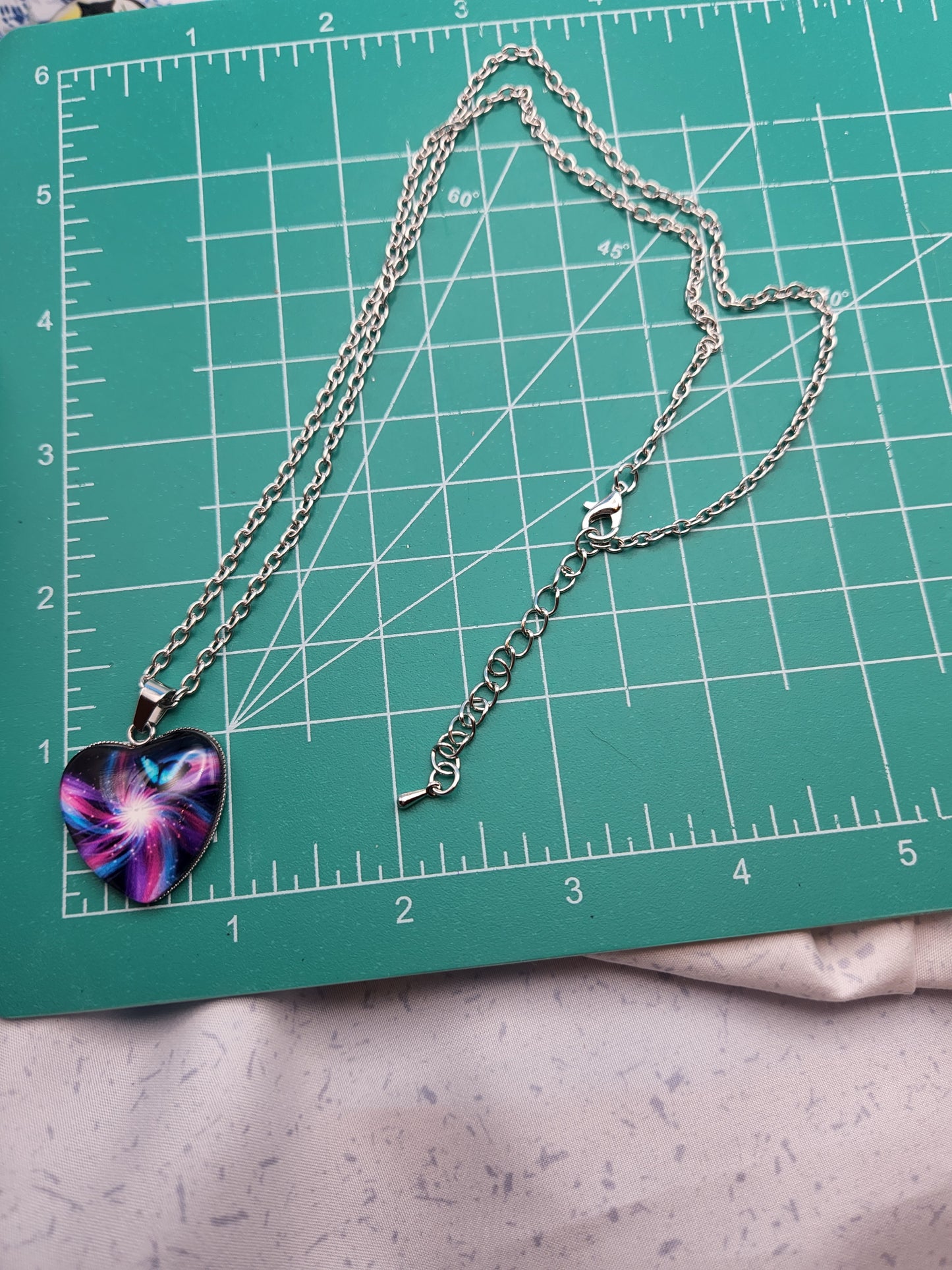 Blue and Mauve Swirl Butterfly Pattern with Heart Shape Glass 1" Necklace