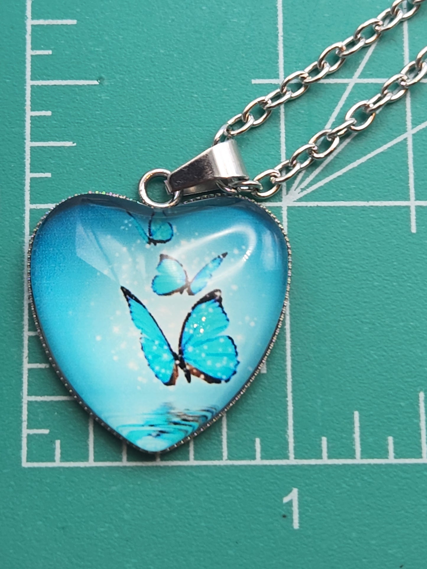 Three Blue Butterfly Pattern with Heart Shape Glass Necklace