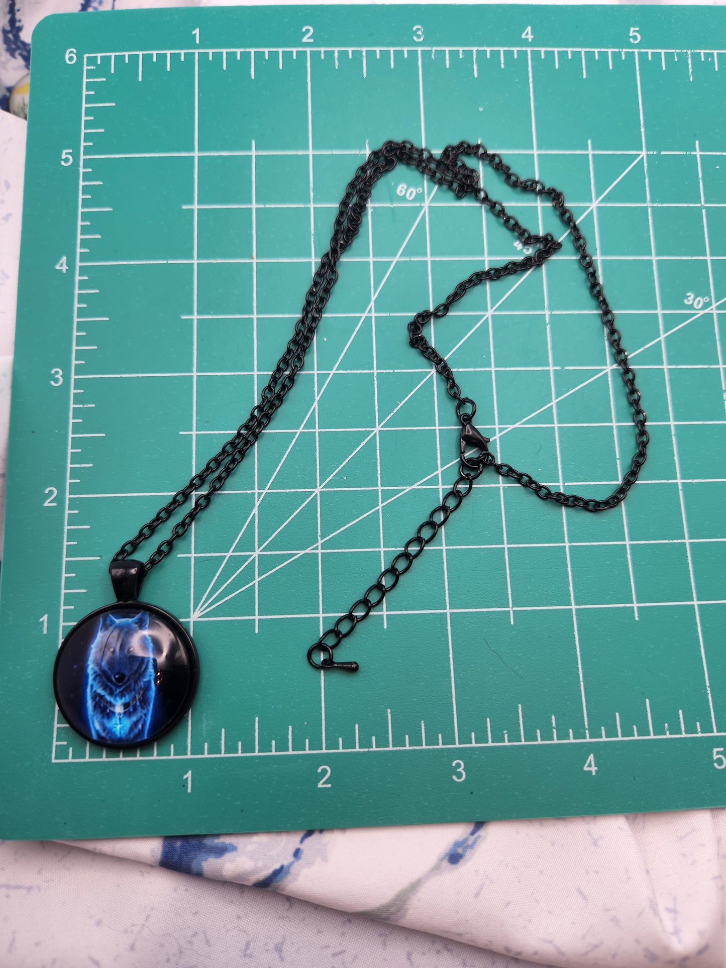 Blue Wolf glow in the dark Necklace with Black Chain