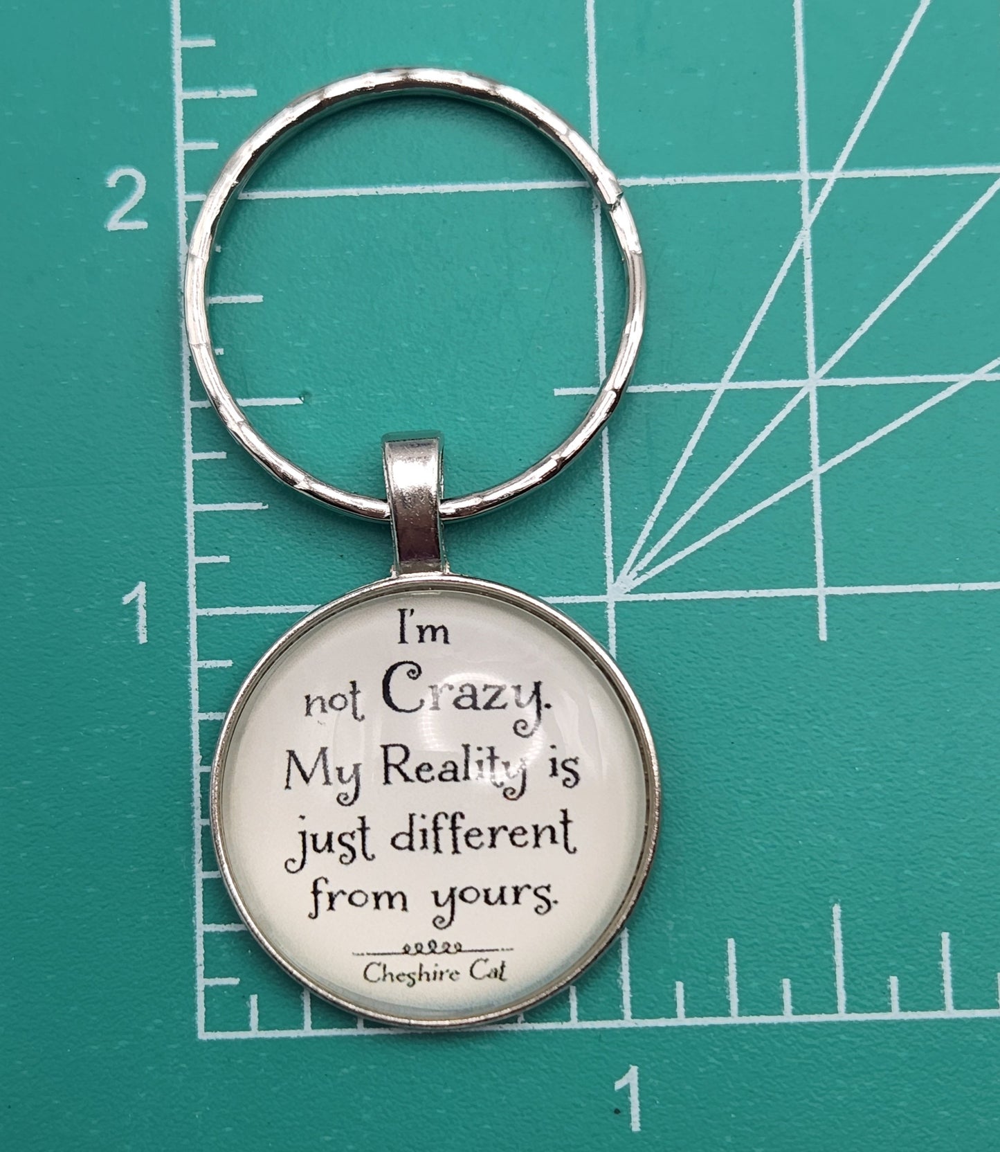 Different Reality Cheshire Cat Key Chain